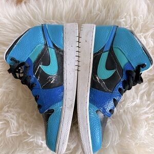 Professionally custom painted Nike Air Jordan's mids